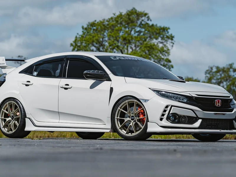 White Honda Civic Type R on bronze wheels