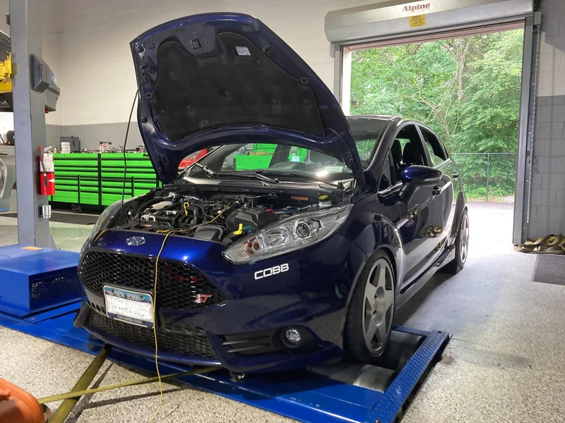 Blue Ford Fiesta ST strapped to a dyno